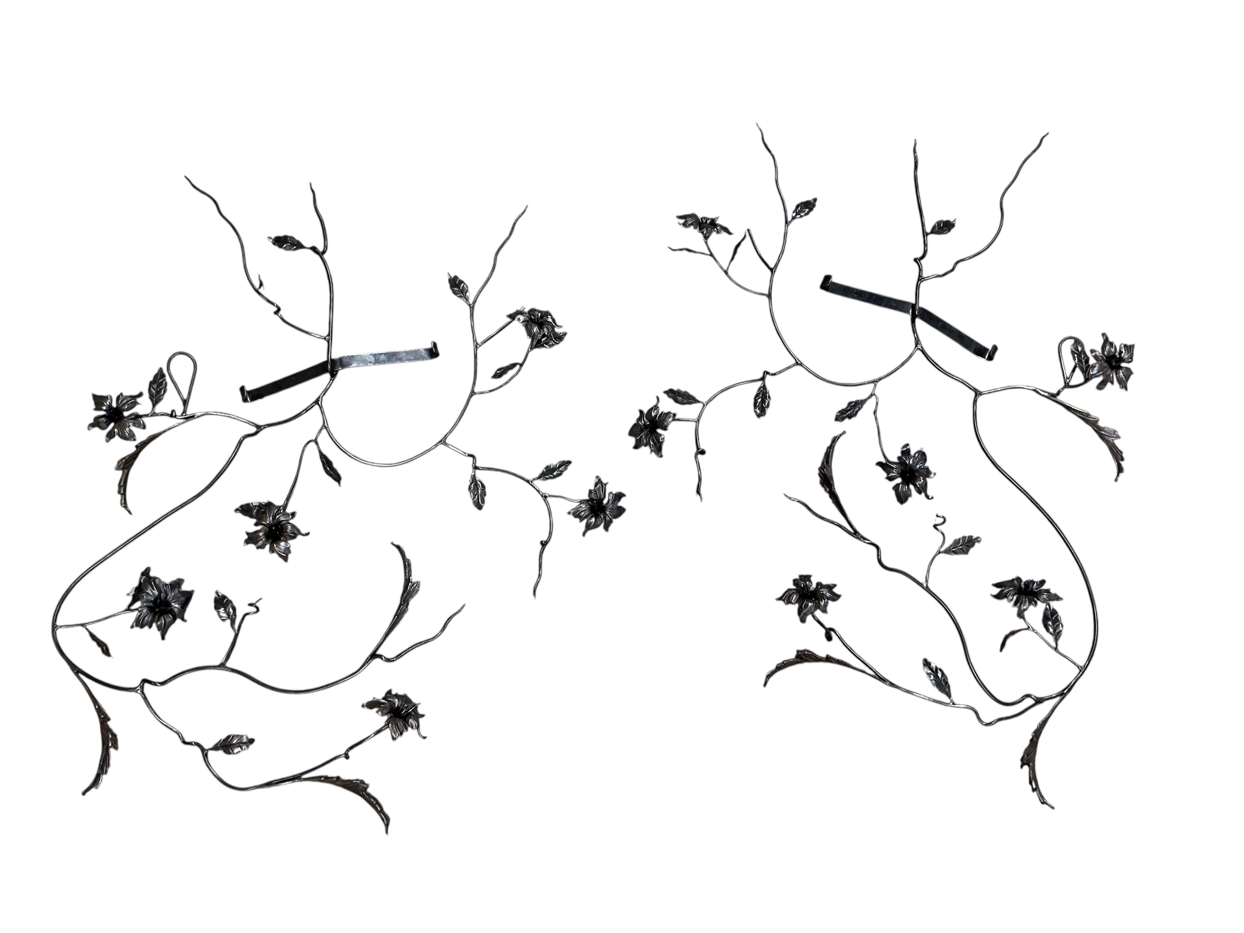 A pair of Contemporary floral wrought iron wall sculptures by Paul Wells, Anvil Ironworks, Brighton